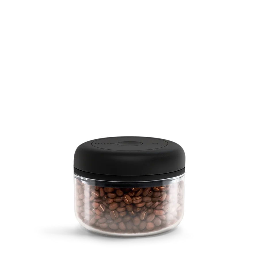 Fellow Clear Atmos Coffee Vacuum Canister featuring an advanced twist mechanism that keeps coffee fresh. 