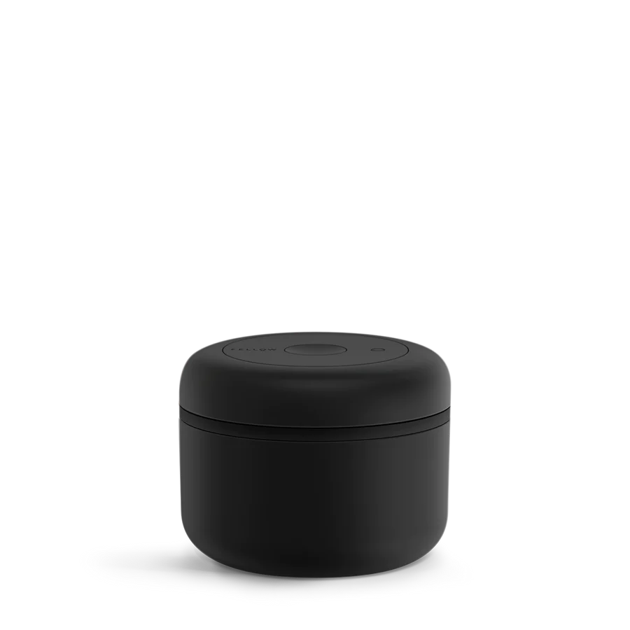 Fellow Black Atmos Coffee Vacuum Canister featuring an advanced twist mechanism that keeps coffee fresh. 