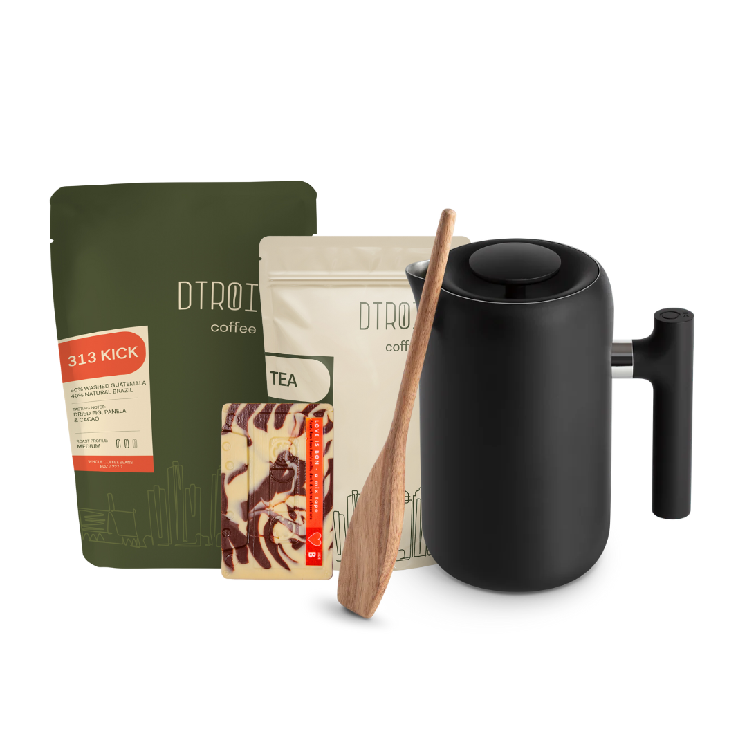 Dtroitr coffee gift bundle featuring Fellow Clara French Press, Dtroitr's 313 Kick Blend, Dtroitr's hibiscus berry herbal tea and BonBonBon Chocolate Cassette Bar